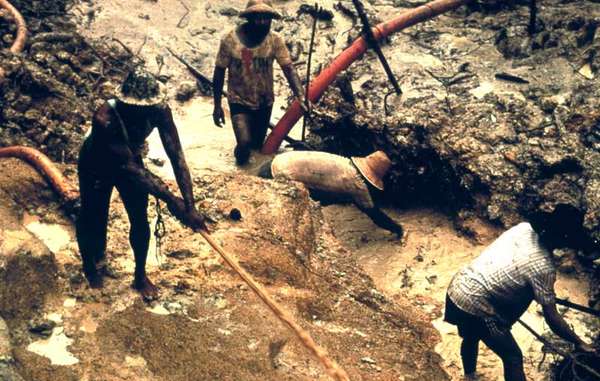 Hundreds of gold miners work illegally on Yanomami land in Brazil and Venezuela.